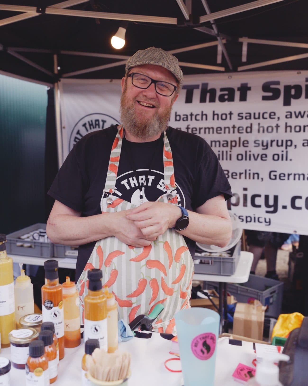 A hot sauce maker at their stall at Berlin Chili Fest.